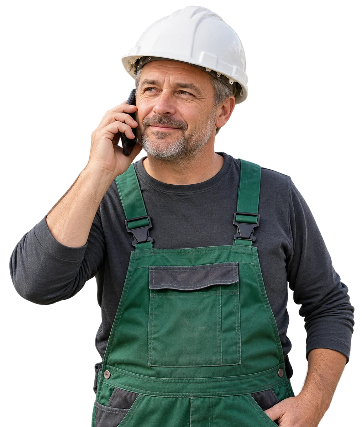 Pracovník v bílé helmě při telefonické domluvě